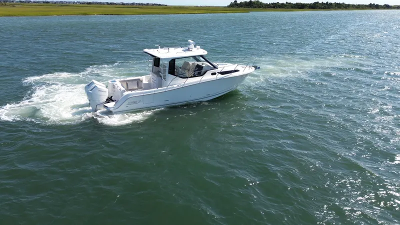 Slide: The Image of Boston Whaler 325 Conquest 2026 - 2