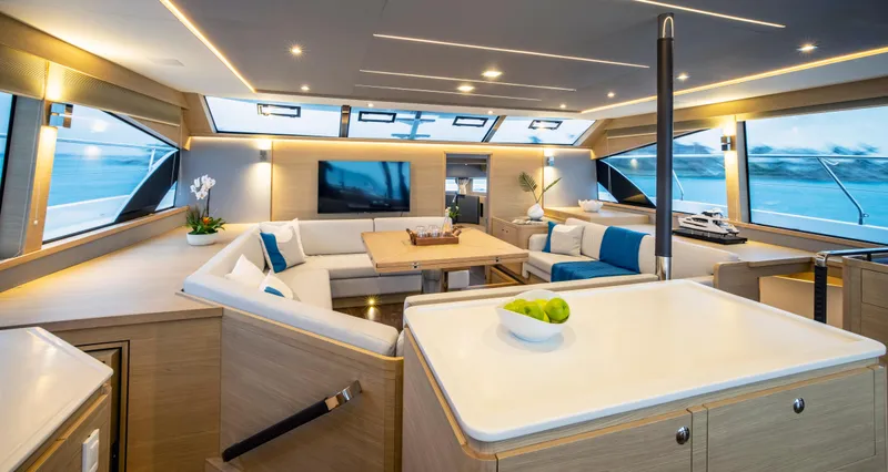 Slide: The Image of Luxurious interior of 2023 Aquila 54 Yacht with modern furnishings and panoramic windows. - 27