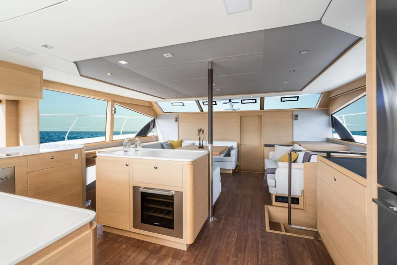 Slide: The Image of Modern interior of 2023 Aquila 54 Yacht with spacious seating and kitchen area. - 47