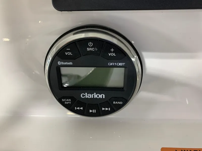 Slide: The Image of Clarion GR10BT Bluetooth stereo system on 2024 Robalo 246 Cayman boat. - 12