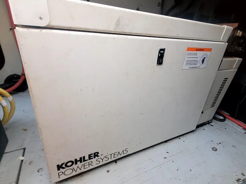 Slide: The Image of Kohler Power Systems generator in a 2004 Meridian 341 Sedan boat. - 30