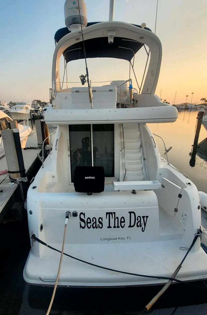 Slide: The Image of 2004 Meridian 341 Sedan yacht named "Seas The Day" docked at sunset in Longboat Key, FL. - 8