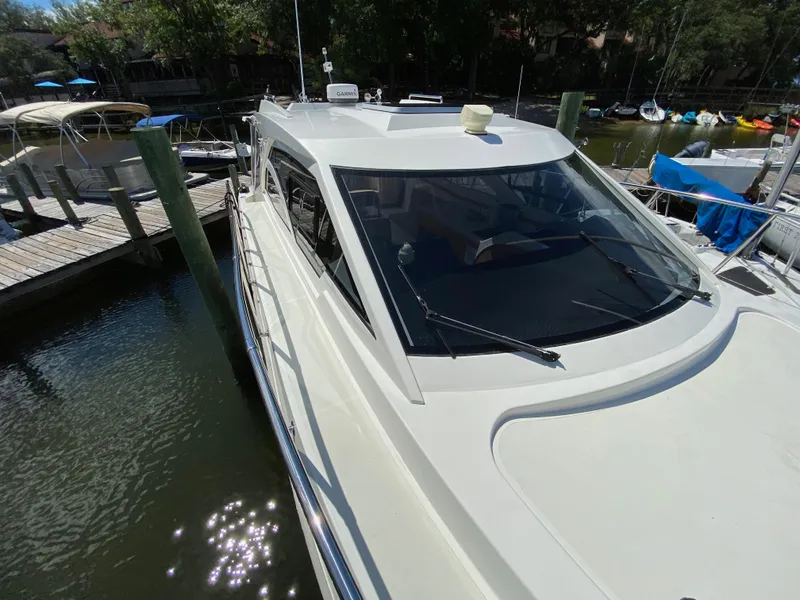 Slide: The Image of Custom Emerald Bay 36, 2018 model, docked at marina. - 11