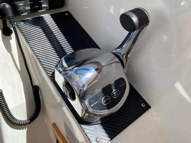 Slide: The Image of Chrome throttle control on a 2018 Custom Emerald Bay 36 boat. - 22