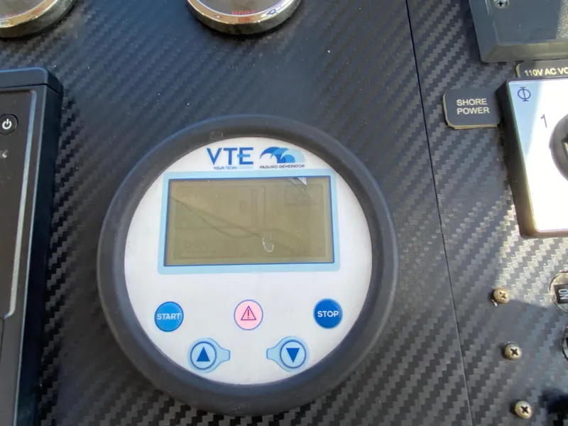 Slide: The Image of Close-up of VTE control panel on 2018 Custom Emerald Bay 36 boat. - 28