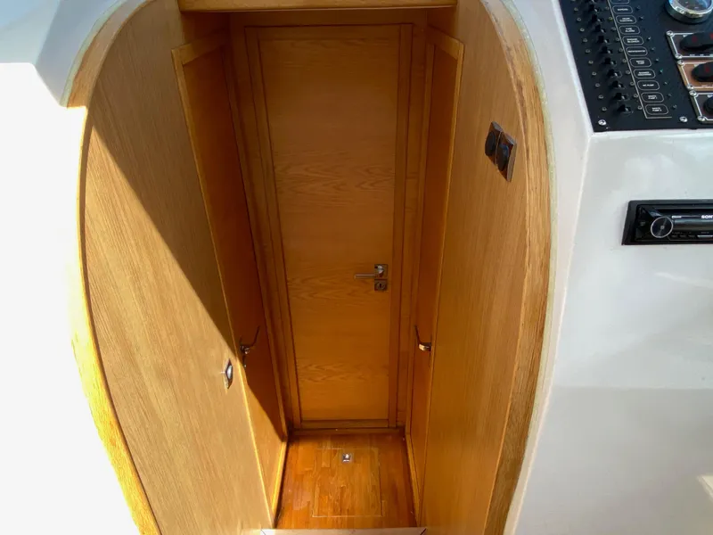 Slide: The Image of Wooden cabin door on a 2018 Custom Emerald Bay 36 yacht. - 30