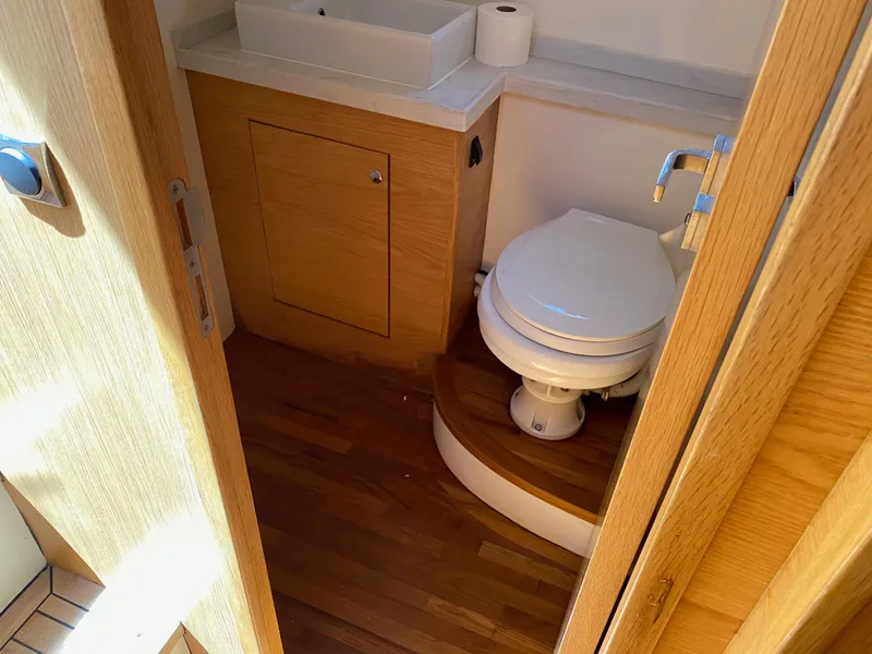 Slide: The Image of 2018 Custom Emerald Bay 36 bathroom with wooden flooring and modern fixtures. - 31