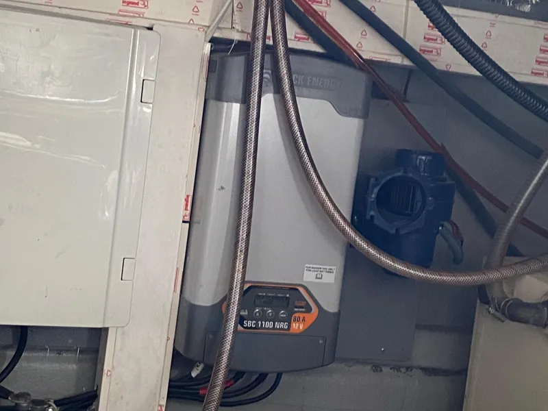 Slide: The Image of Electrical system components in a 2018 Custom Emerald Bay 36 boat. - 43