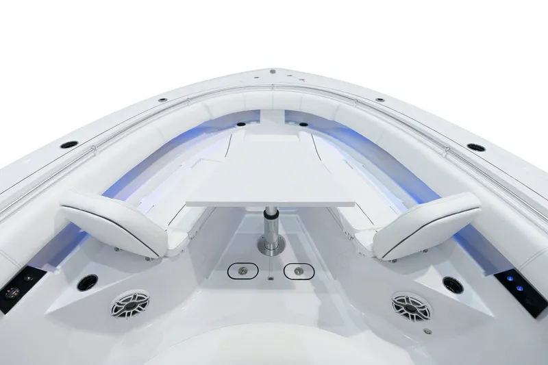 Slide: The Image of 2025 Sportsman Open 352 Center Console boat interior with seating and table. - 10