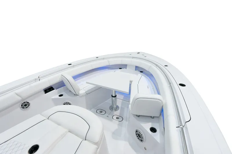 Slide: The Image of 2025 Sportsman Open 352 Center Console boat interior with seating and table. - 11