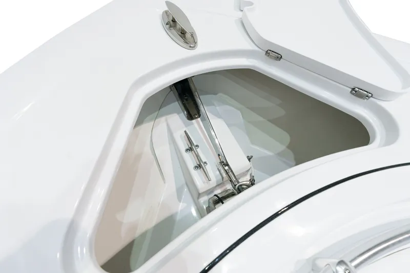 Slide: The Image of 2025 Sportsman Open 352 Center Console storage compartment. - 12