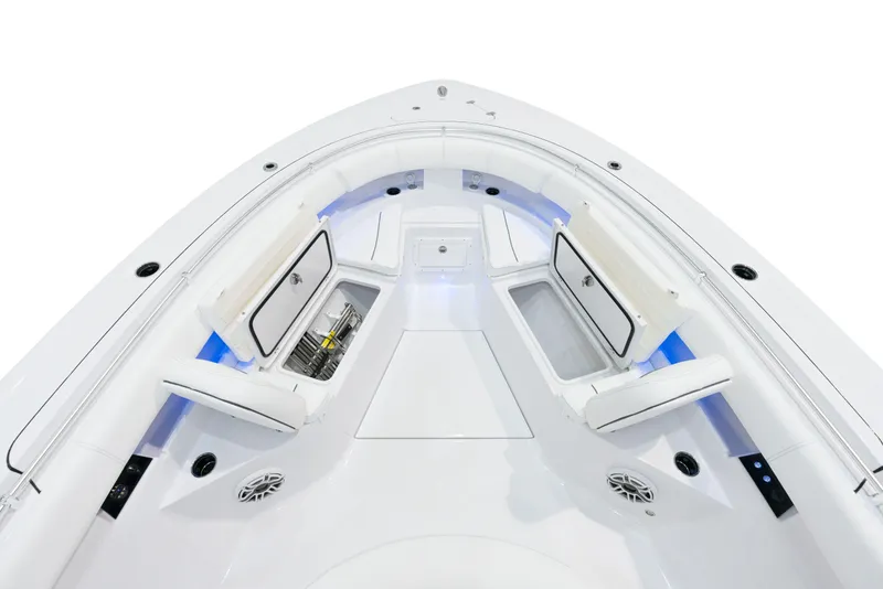 Slide: The Image of 2025 Sportsman Open 352 Center Console boat interior with seating and storage compartments. - 13
