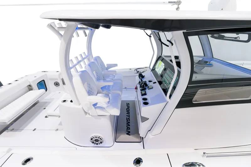 Slide: The Image of 2025 Sportsman Open 352 Center Console boat interior with advanced navigation controls. - 15