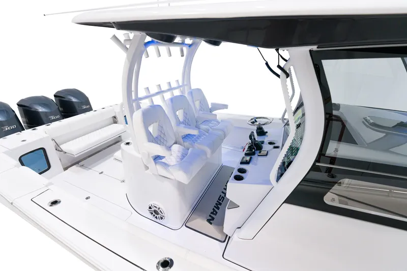 Slide: The Image of 2025 Sportsman Open 352 Center Console boat with triple engines and modern seating. - 16