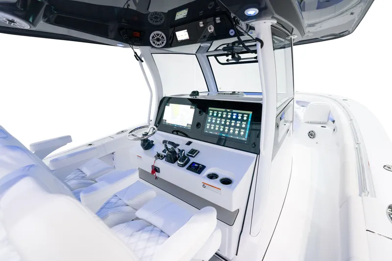 Slide: The Image of 2025 Sportsman Open 352 Center Console boat interior with advanced navigation system. - 17