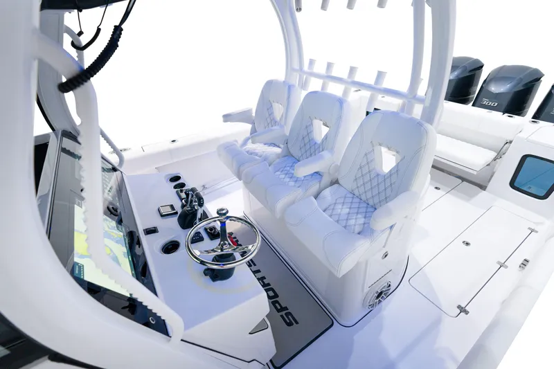 Slide: The Image of 2025 Sportsman Open 352 Center Console boat interior with helm and seating. - 18