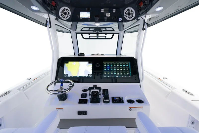 Slide: The Image of 2025 Sportsman Open 352 Center Console boat dashboard with advanced navigation and control systems. - 20