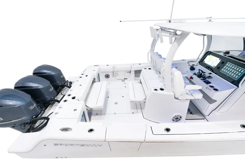 Slide: The Image of 2025 Sportsman Open 352 Center Console boat with triple outboard engines. - 22