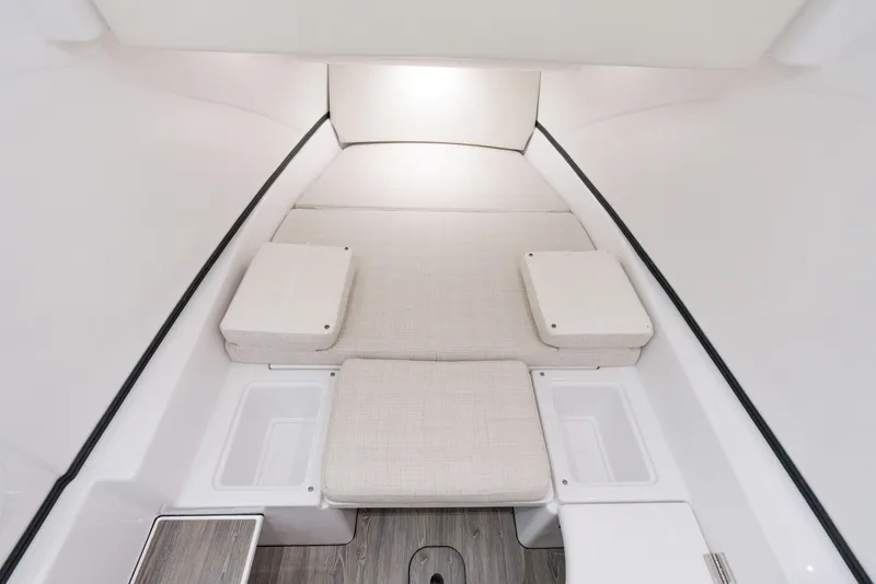 Slide: The Image of 2025 Sportsman Open 352 Center Console cabin interior with cushioned seating. - 30