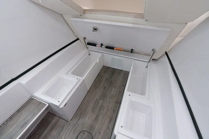 Slide: The Image of Interior storage compartments of 2025 Sportsman Open 352 Center Console boat. - 33