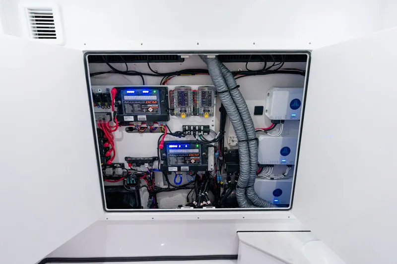Slide: The Image of Electrical system compartment of 2025 Sportsman Open 352 Center Console boat. - 35