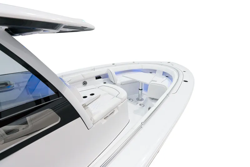 Slide: The Image of 2025 Sportsman Open 352 Center Console boat with sleek white design and spacious seating. - 5