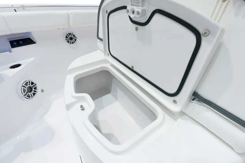 Slide: The Image of 2025 Sportsman Open 352 Center Console storage compartment. - 8