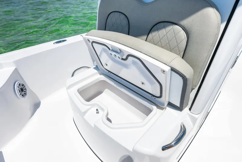 Slide: The Image of 2024 Sportsman Masters 247 Bay Boat with open storage compartment. - 6