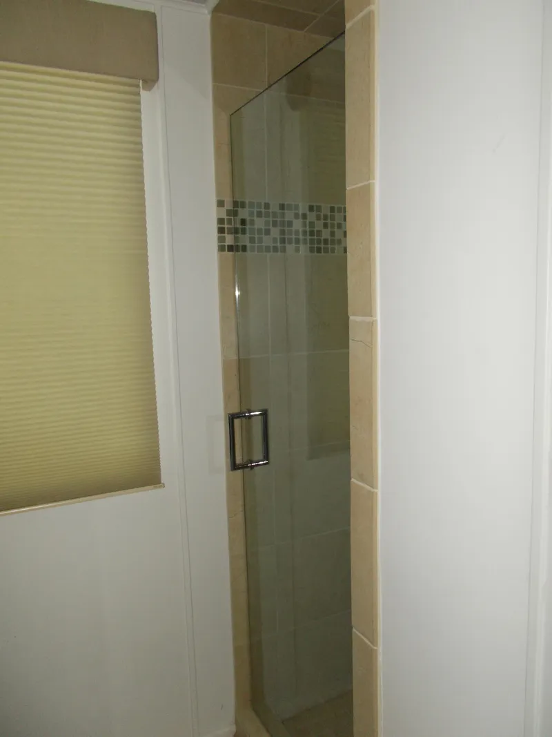 Slide: The Image of Top deck of a 1992 Jamestowner Silver Lining houseboat docked at a marina. - 14