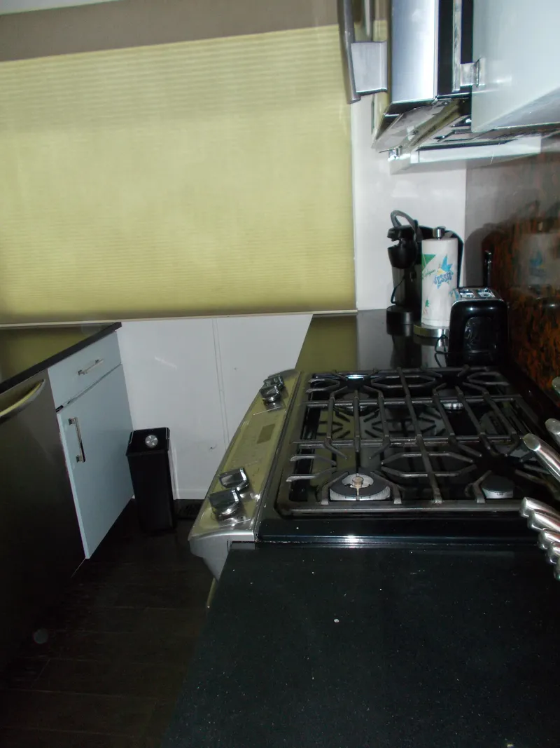 Slide: The Image of Upper deck of 1992 Jamestowner Silver Lining houseboat with helm and seating area. - 22