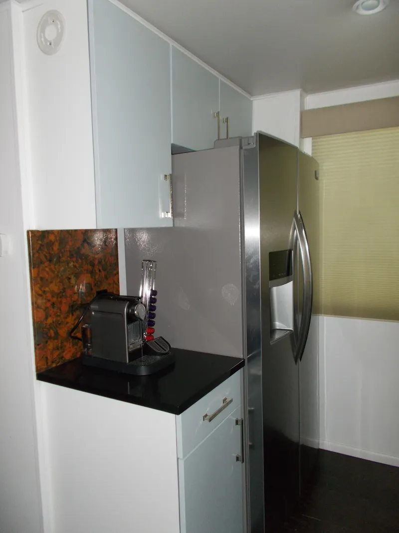 Slide: The Image of Upper deck of 1992 Jamestowner Silver Lining houseboat at sunset, featuring seating and fire pit. - 24