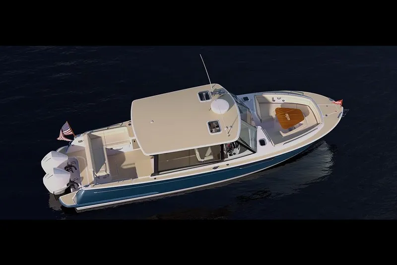 Slide: The Image of 2023 MJM 3 boat cruising on water, top view. - 5