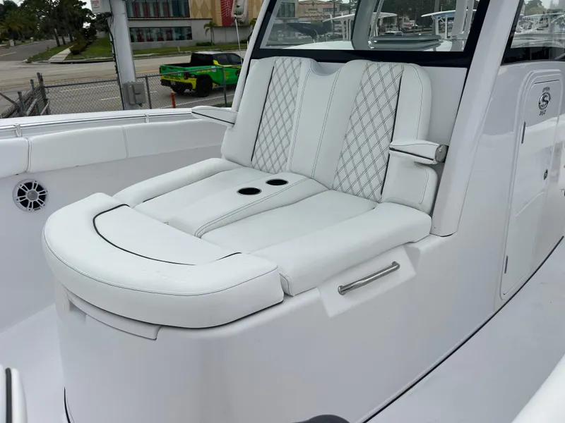 Slide: The Image of 2024 Sportsman Open 352 boat with luxurious white seating. - 12