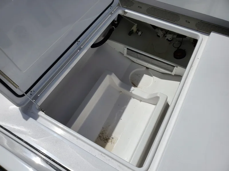Slide: The Image of Open storage compartment on a 2024 Sportsman Open 352 boat. - 19