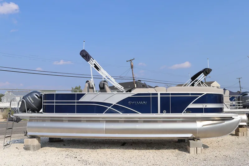 Slide: The Image of 2023 Sylvan L3 Party Fish pontoon boat on display, featuring sleek design and modern amenities. - 2