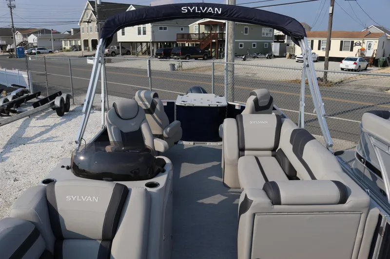 Slide: The Image of 2023 Sylvan L3 Party Fish pontoon boat with spacious seating and modern design. - 5