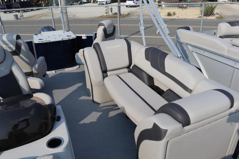 Slide: The Image of 2023 Sylvan L3 Party Fish boat interior with plush seating and modern design. - 6