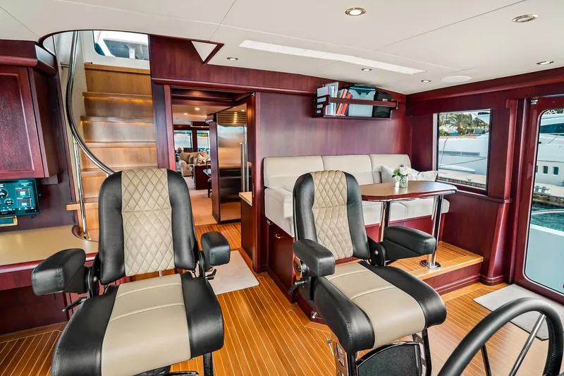 Slide: The Image of Luxurious 2002 NorthCoast Pilothouse Motoryacht interior with elegant seating and wood finishes. - 15