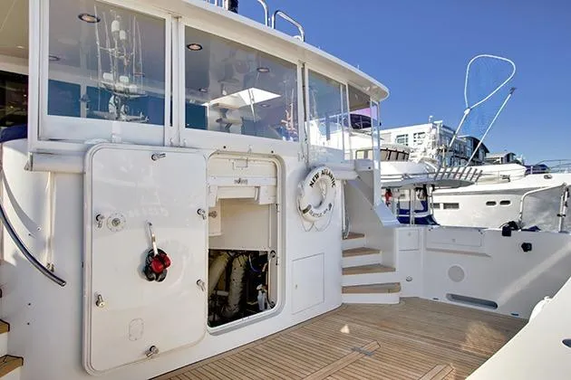 Slide: The Image of The image shows the deck of a 2002 Northcoast Yachts Raised Pilothouse Motor Yacht. - 46