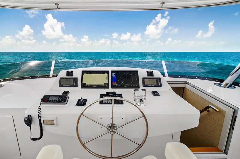 Slide: The Image of Pilothouse of 2002 NorthCoast Motoryacht with ocean view and navigation equipment. - 10