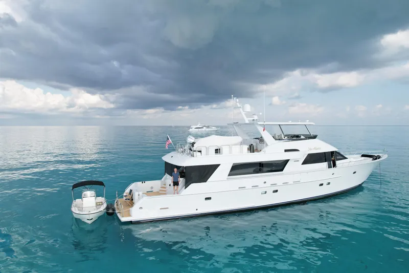 Slide: The Image of 2002 NorthCoast Pilothouse Motoryacht on calm ocean under cloudy sky. - 3