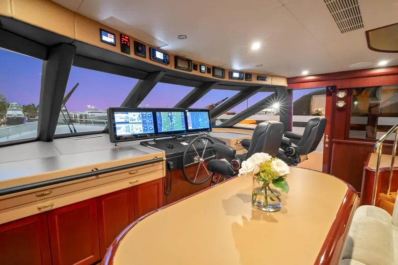 Slide: The Image of Luxurious 2002 NorthCoast Pilothouse Motoryacht interior with modern navigation equipment. - 14