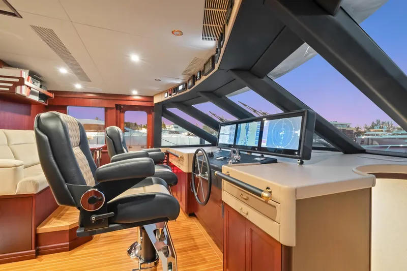 Slide: The Image of Luxurious 2002 NorthCoast Pilothouse Motoryacht interior with modern navigation equipment. - 13
