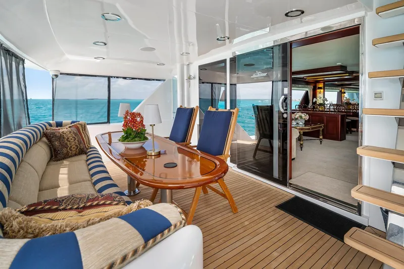 Slide: The Image of Luxurious 2002 NorthCoast Pilothouse Motoryacht interior with elegant seating and ocean view. - 17