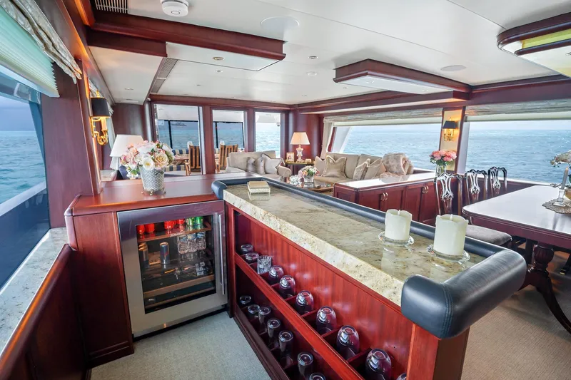 Slide: The Image of Luxurious interior of 2002 NorthCoast Pilothouse Motoryacht with elegant bar and ocean view. - 27