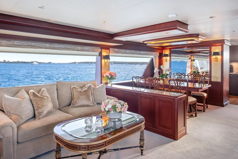 Slide: The Image of Luxurious 2002 NorthCoast Pilothouse Motoryacht interior with elegant dining and seating area. - 25
