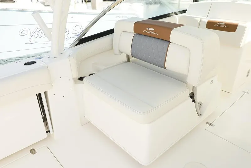 Slide: The Image of 2024 Cobia 280 Dual Console boat interior seating. - 10