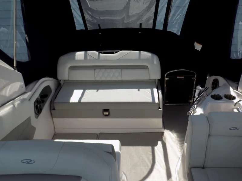 Slide: The Image of Interior of 2022 Regal 28 Express boat with seating and canopy. - 7