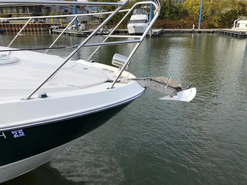 Slide: The Image of 2009 Maxum 3100 SE boat bow with anchor in marina. - 4