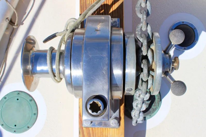 Slide: The Image of Anchor windlass on 1988 Cape George 38 sailboat deck. - 20